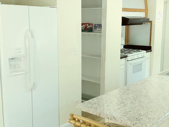 Kitchen with Refrigerator Included.