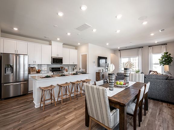 Enjoy time with friends and family in the bright, open-concept living space.