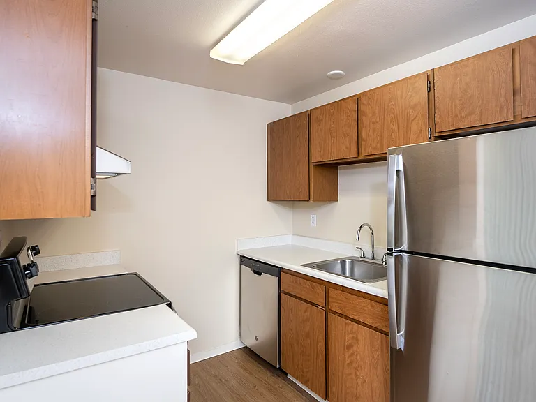 Explore this sleek kitchen featuring modern appliances and ample storage. Explore this sleek kitchen featuring modern appliances and ample storage.