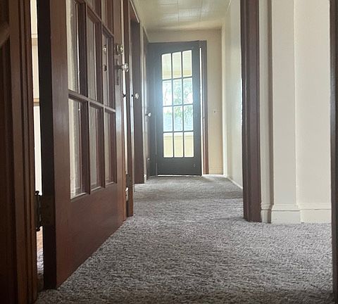 Living room and bedroom to the right. Sunroom straight ahead. kitchen and bath to the left.