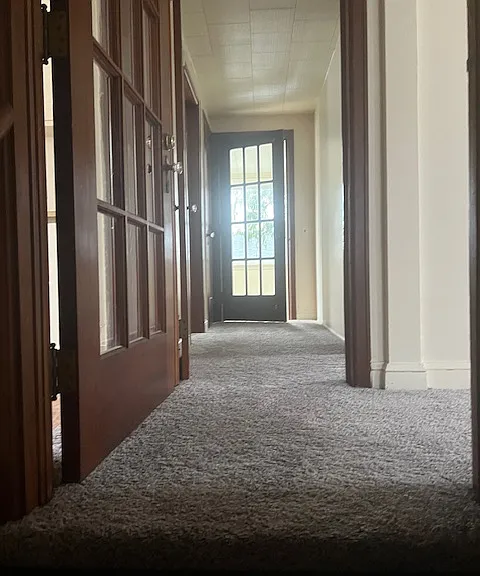 Living room and bedroom to the right. Sunroom straight ahead. kitchen and bath to the left.