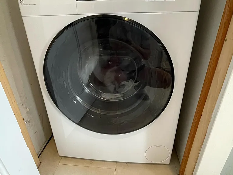 Downstairs closet with washer/dryer combo