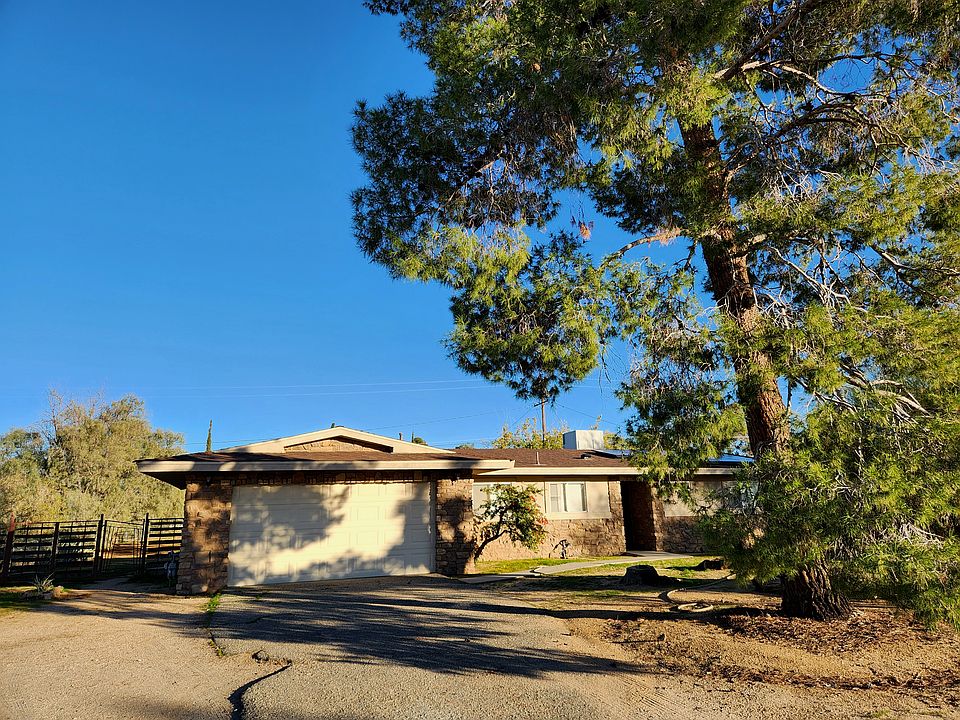 Exterior front of home with 2-car garage.