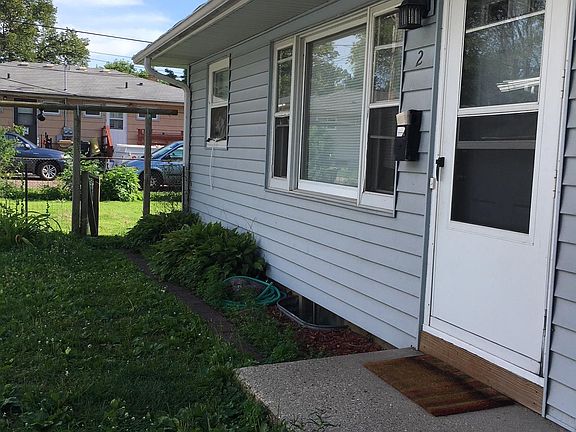 Unit 2 Entrance and view into backyard