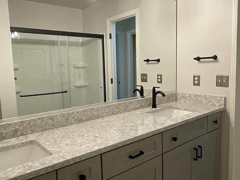 Newly remodeled Master bath with double sinks and shower