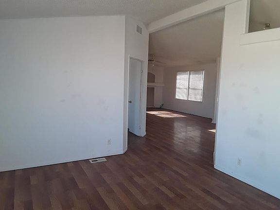 Living Room Area which leads to master bedroom and family room area