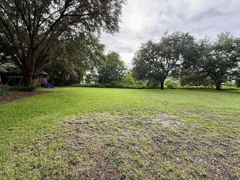 8716 Canopy Oaks Dr — Photo 54