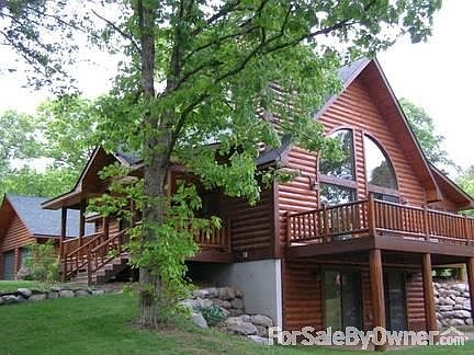 Custom Log sided home
						:
						Exceptionally maintained and professionally landscaped