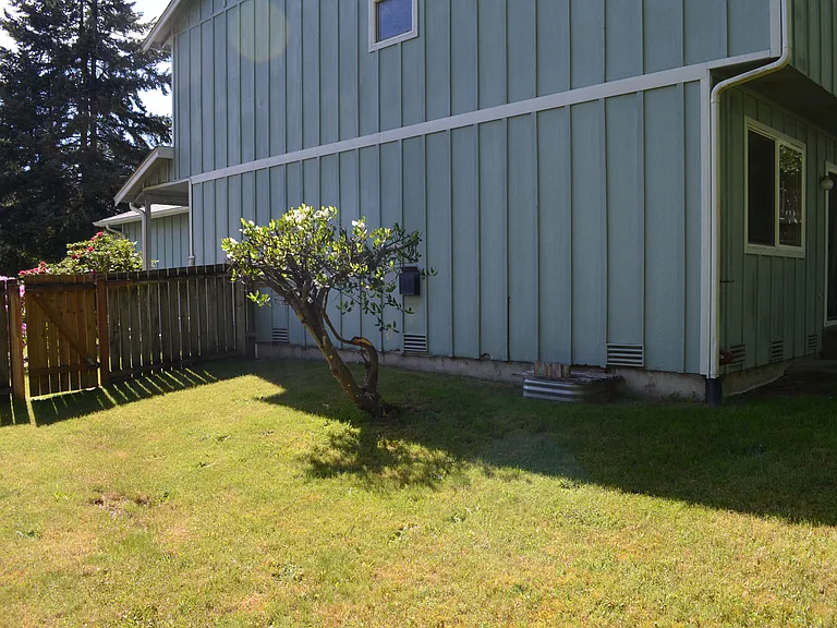 Spacious side yard.