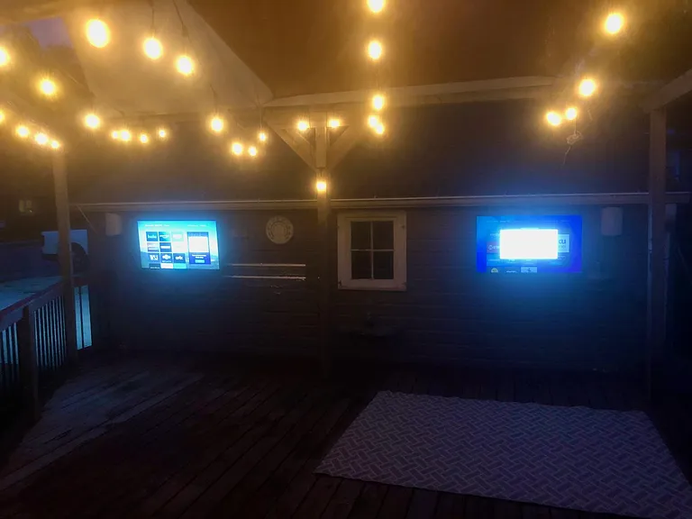 Night view of patio with outdoor TV's (furnished by landlord and installed in April thru Nov).