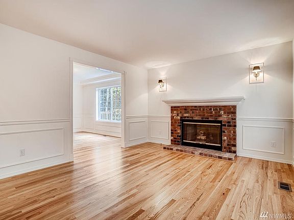 Formal Living Room leads into the Formal Dining. Large rooms offer a place for everyone to gather.