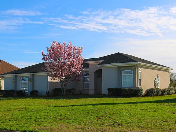 Located on a large level 2/3-acre lot