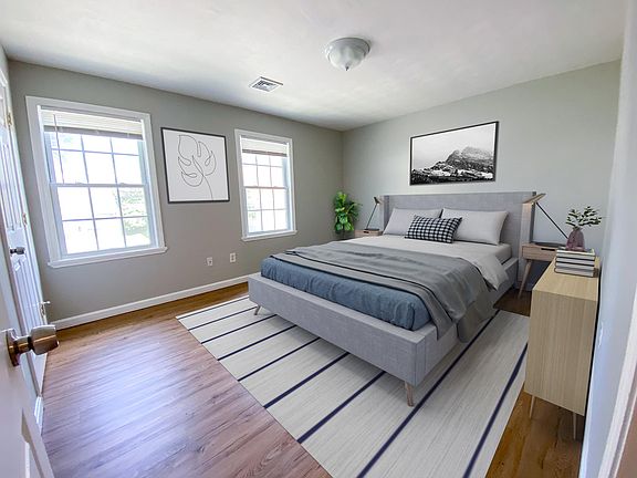 The primary bedroom boosts two large closets, and plenty of space for a King or Queen bed. 

Please note this is an UNFURNISHED unit.
