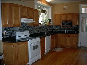 KT has new granite & tile backsplash