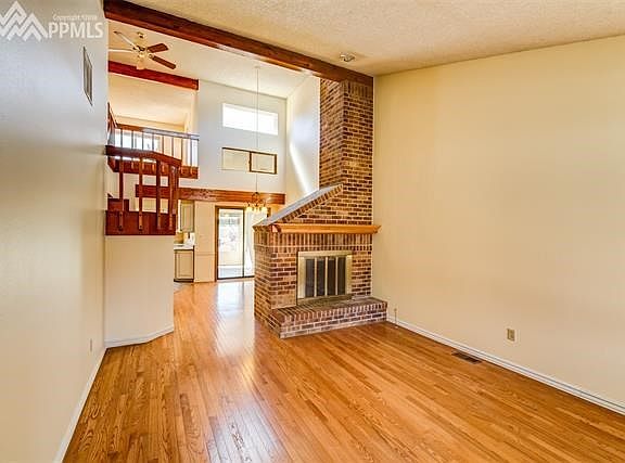 Main level living room with gas fireplace