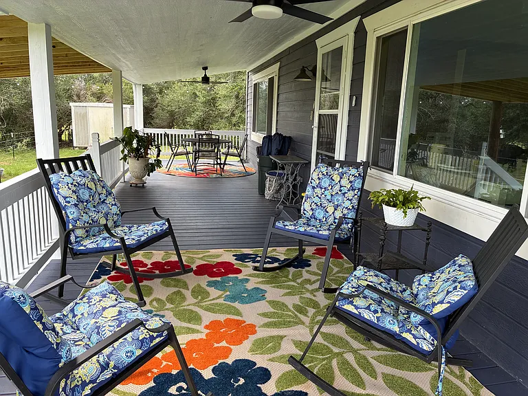 Back porch for sitting and outdoor dining