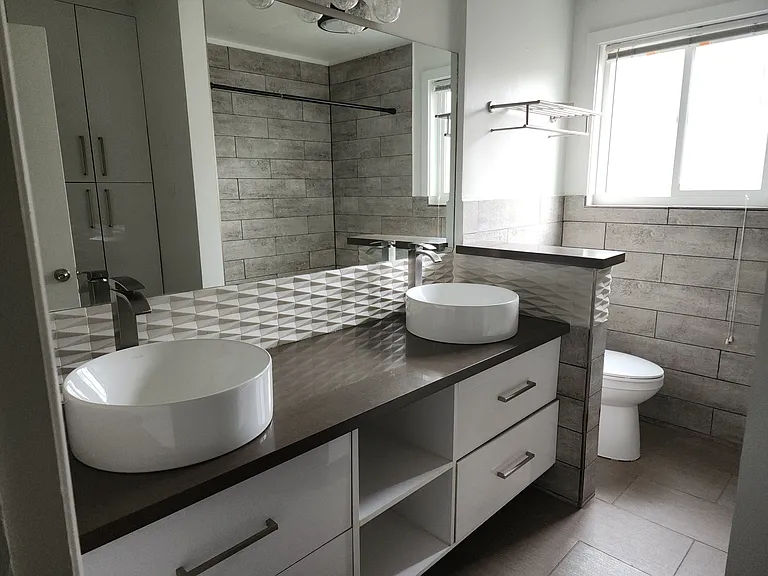 Double sink vanity allows for efficiency in getting ready.