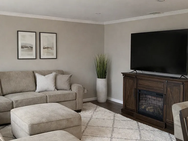 living room area how it was previously furnished