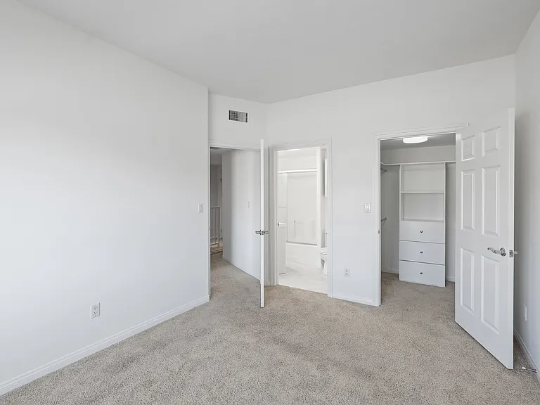 Bedroom with Bathroom and Walk-In Closet with Built-In Organizers