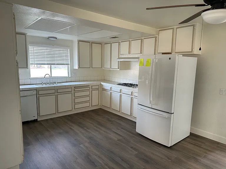 Kitchen with included refridgerator.
