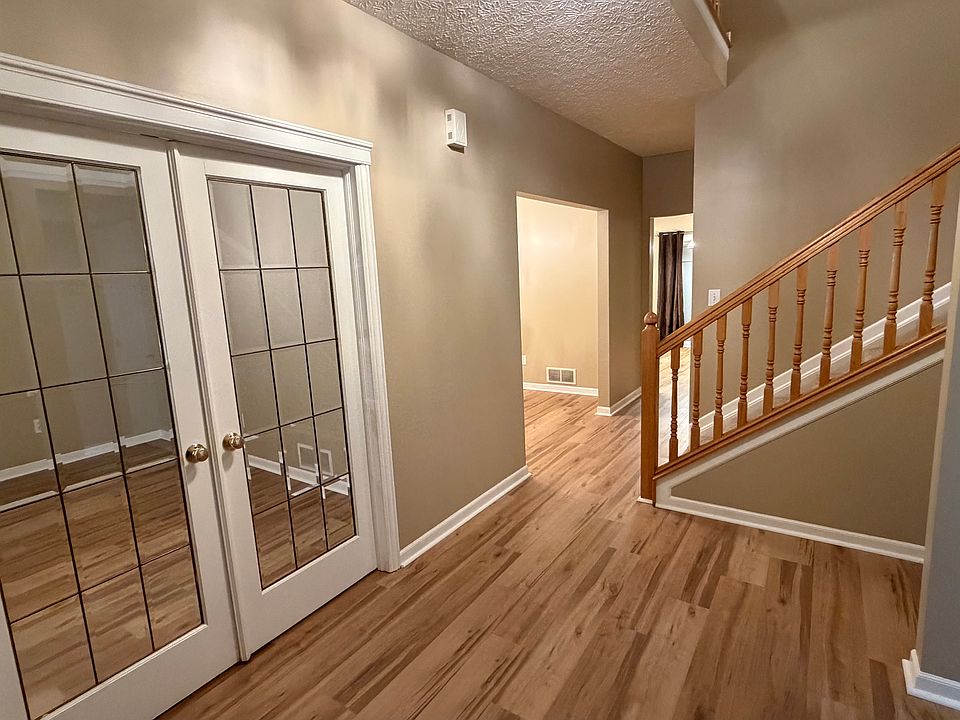 Foyer with French door to the den/office.