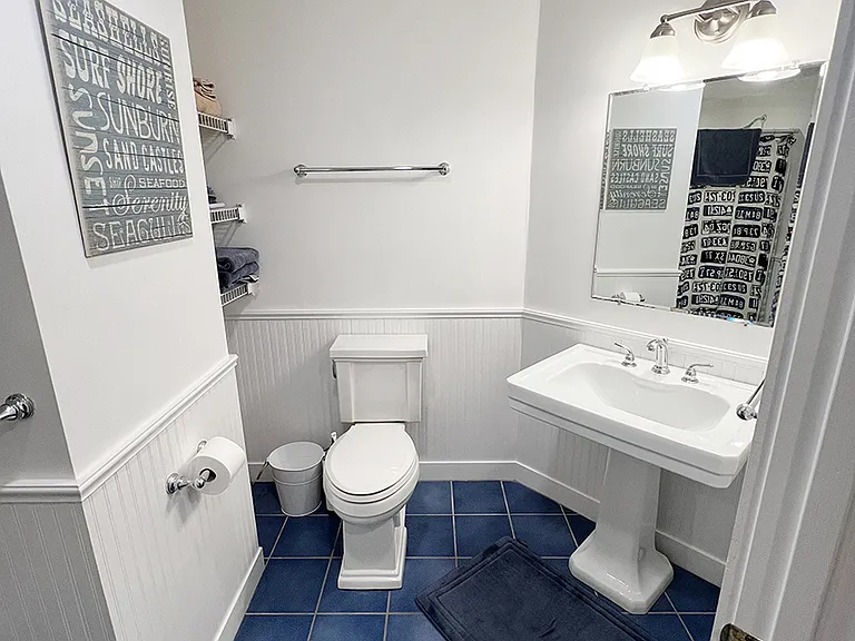 Second floor bathroom with shower, hair dryer, etc., service the two top right bedrooms.