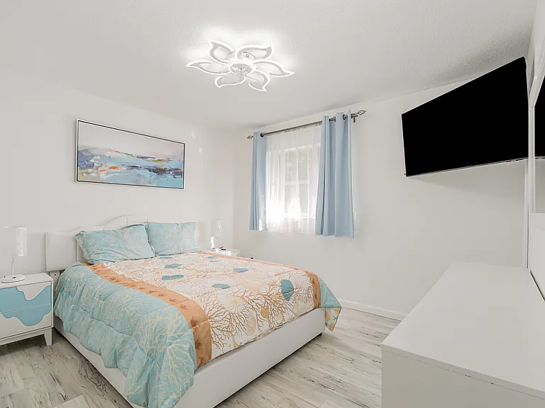 2nd Bedroom Queen size bed. 2 nightstands, Dresser, 50" Smart Samsung TV