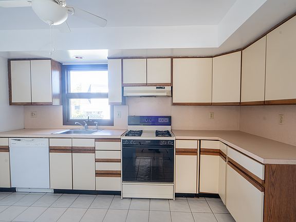 plenty of counter space in the kitchen, offering ample room for meal prep and cooking convenience.