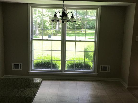 eat in kitchen area that faces backyard