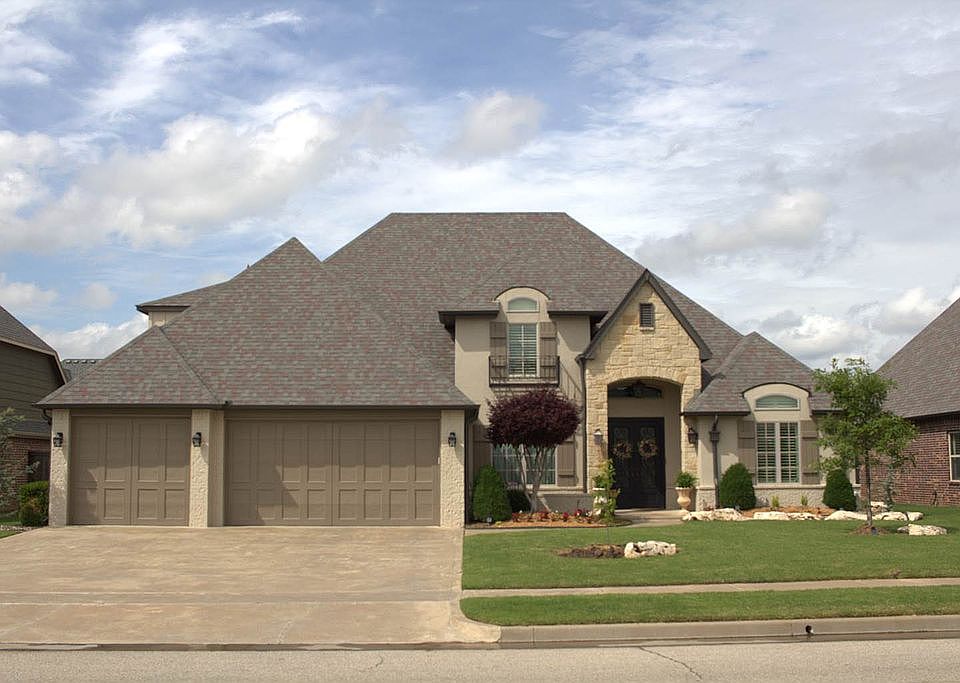 Front View with 3 car garage