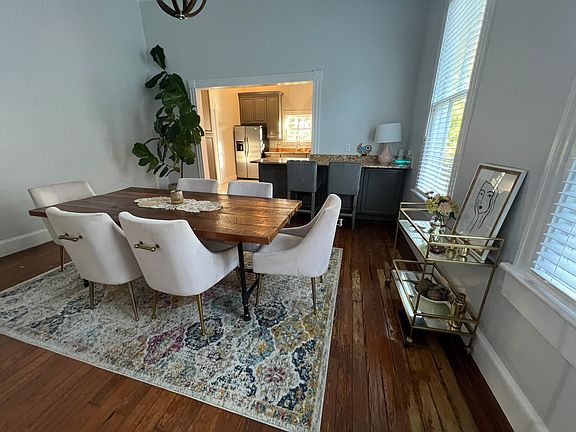 Dining room off large kitchen with bar