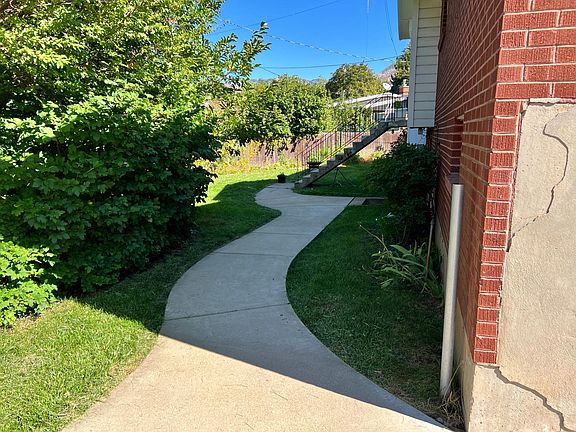 Walkway to walkout basement and back yard