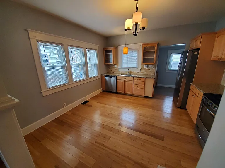 KITCHEN W/ VIEW TO LAUNDRY ROOM