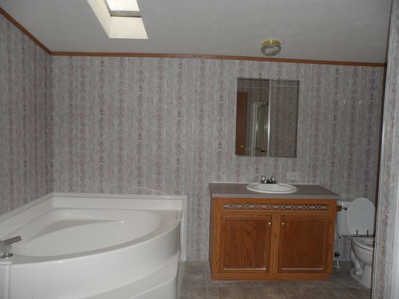 Master bath with large tub and seperate shower.