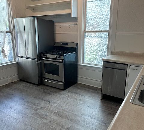 Large eat-in kitchen with 2 windows.