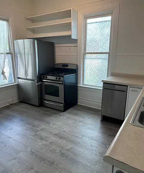 Large eat-in kitchen with 2 windows.
