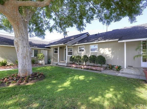 Trees enhance the value of a home and, if planted on the west side, can also reduce energy costs significantly.  This attractive home with a mature shade tree enjoys the late afternoon breezes, so plan on sitting in the shade of this gorgeous elm after a 
