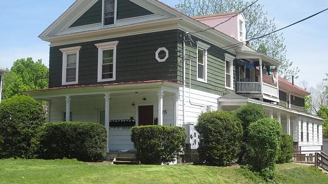 Exterior of House. Unit located on second and third floors.
