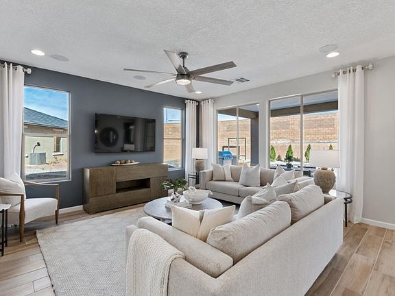 Gathering room with bright windows to bring in natural lighting.