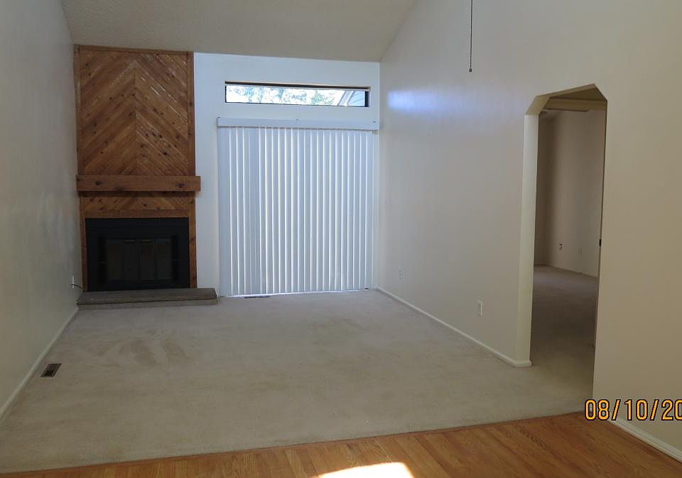 Living room with wood fireplace