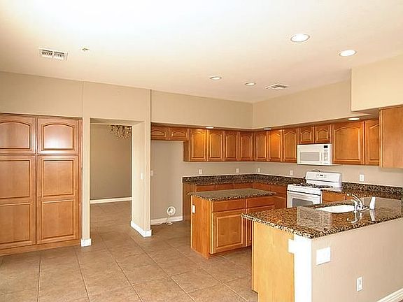 5th image of 9607 W Quail Track Dr
