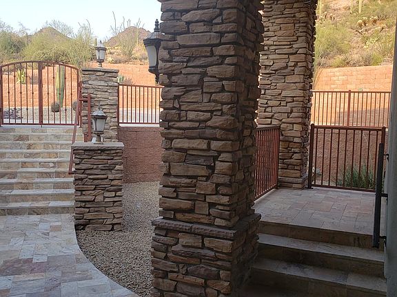 Steps and Gate to the large circular Driveway
Casita Front Entrance on the right