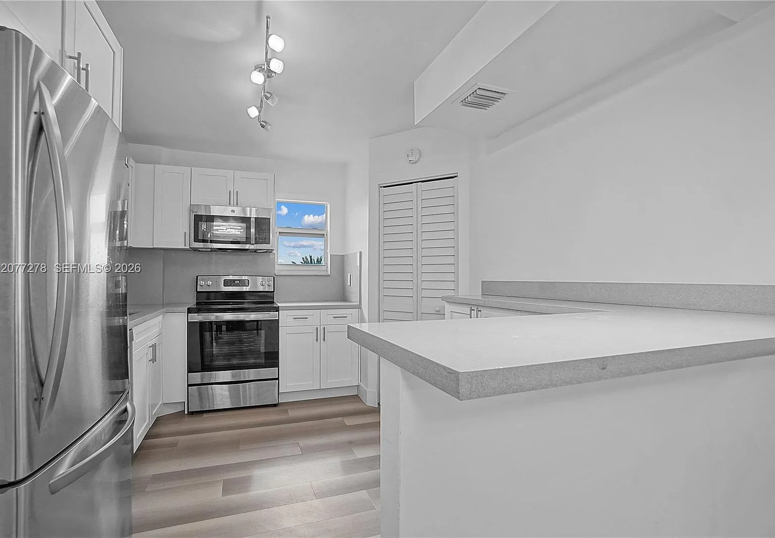 9273 Collins Ave — Photo 2