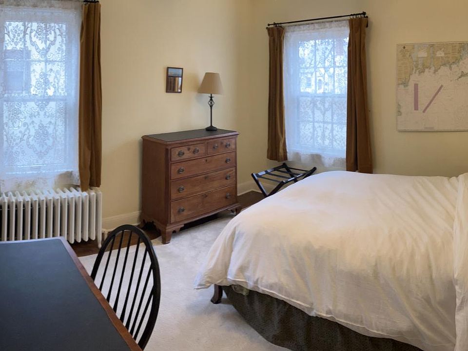 Full sized bed, Stearns & Foster comfy mattress on sleigh style bed. Lovely furniture and curtains that can block out light.