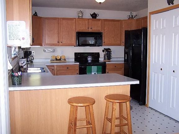 This kitchen is very efficient for the cooks in the family.