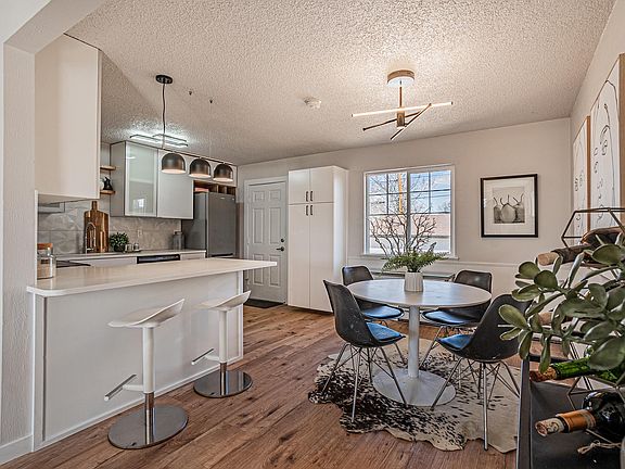 Kitchen and nook. Door to backyard and garage