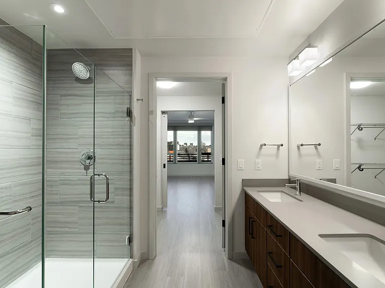 Ultra Modern Bathroom with Tile bathroom floors with floor-to-ceiling tile shower and tub surrounds