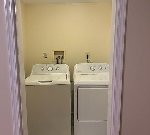 Laundry in the Unit from Kitchen.