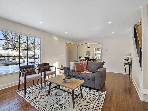 Living room that opens up to dining room.