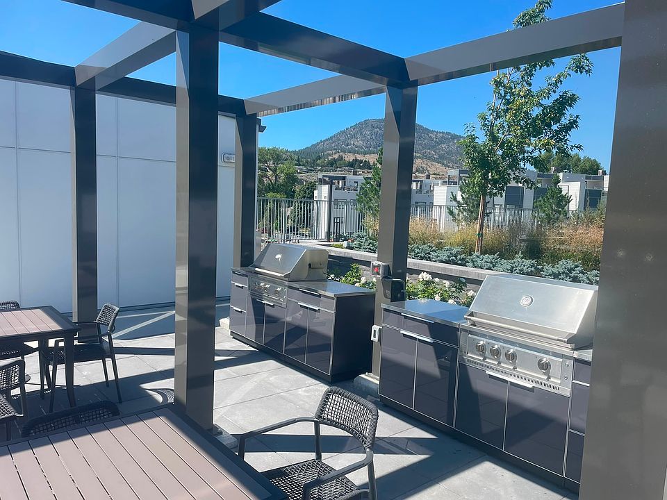 Poolside BBQ grills and tables